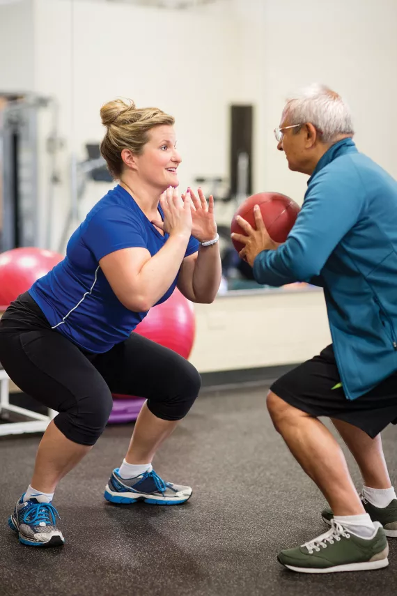 A personal trainer giving a private lesson