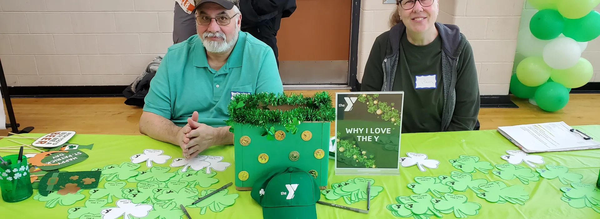 Two volunteers at Lep Loop Race Table